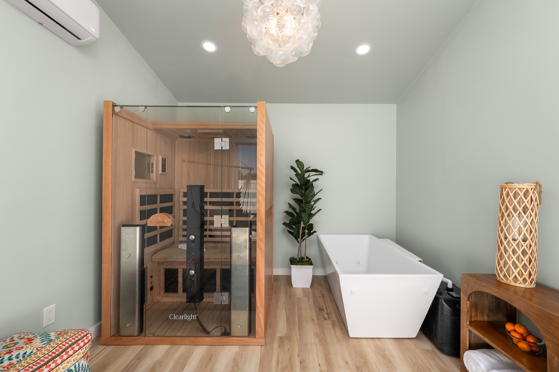 Cold plunge tub and infrared sauna in the wellness building at Shell Yeah